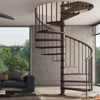 Spindeltreppe Phola Ø 180 cm mit 12 Steigungen Buche natur oder gebeizt inkl. Podest inkl. Geländer mit senkrechten Stäben und segmentierter Holzhandlauf, Geschosshöhe 246 - 288 cm, erweiterbar bis 408 cm, Metallteile pulverbeschichtet.