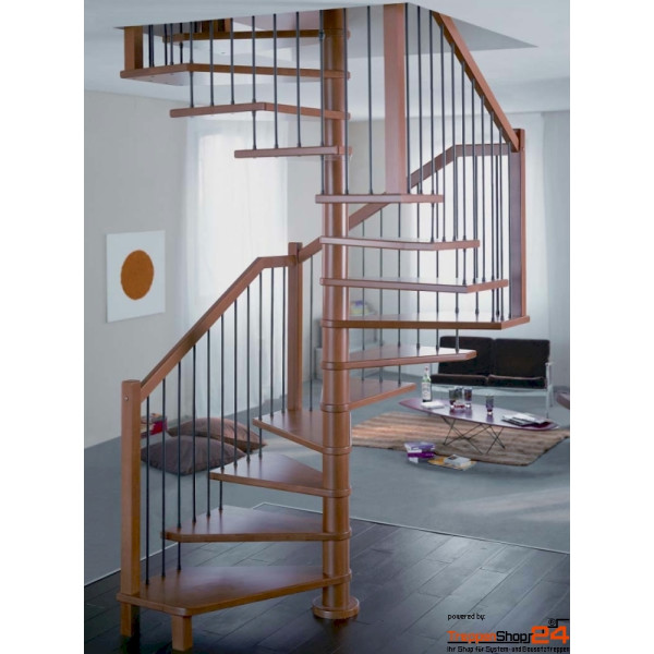 quadratische Spindeltreppe Ginestra G 170 x 170 cm, 12 Steigungen (11 Stufen + Podest) aus Buche, optional mit Geländer aus Metallpfosten Ø 30 mm (pulverbeschichtet), Holzhandlauf Ø 50 mm und 5 Untergurten Ø 10 mm aus Edelstahl. Alle Holzteile Buche Natur oder gebeizt und fertig lackiert.